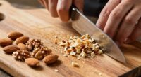 chopping nuts carefully with knife